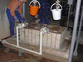 Leaking sulphuric acid had damaged pump base 