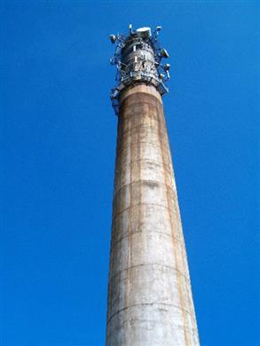 Deteriorated concrete chimney stack